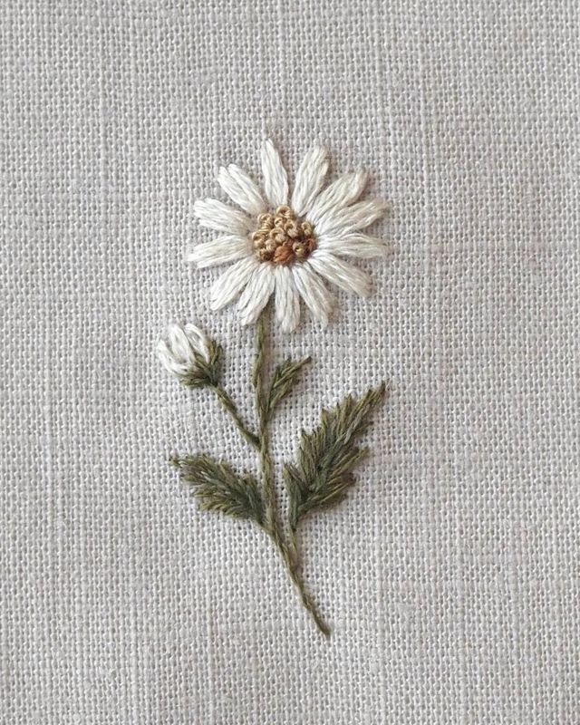 Embroidered daisy in a hoop